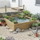 Grand bassin surélevé avec cascade /  2.25 x 2.25 x 0.65m